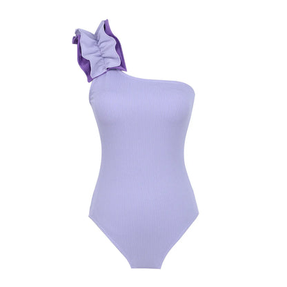 Women's single-shoulder suspender tube top one-piece swimsuit in a high-waist design on a model.