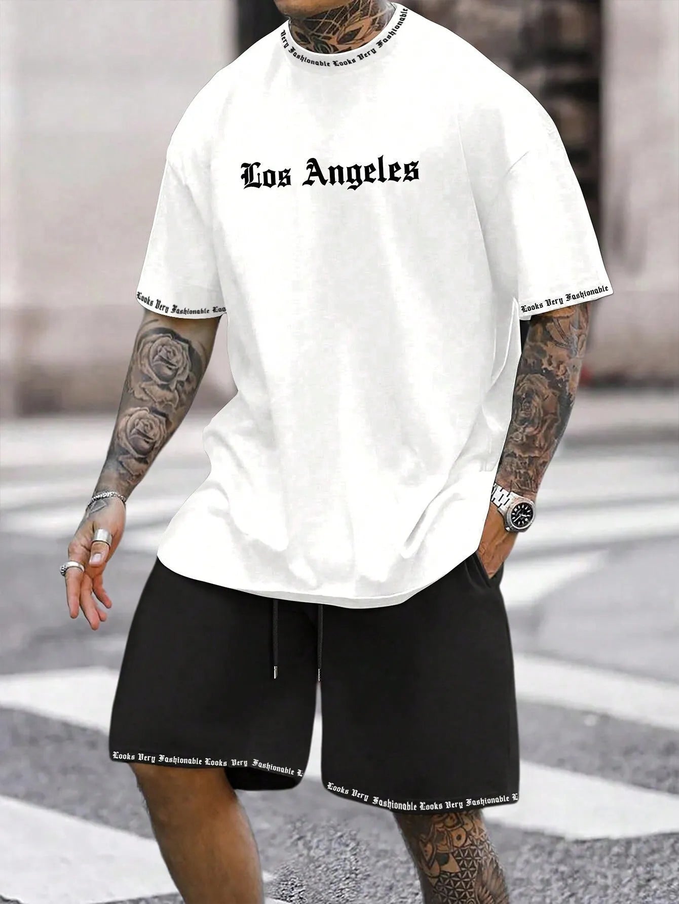 Man wearing a printed short-sleeve sports top and matching shorts in a quick-dry polyester blend.