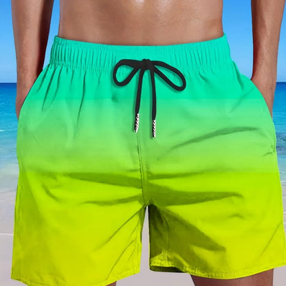 Men's grey gradient print sports shorts made from breathable mesh fabric, shown on a model.