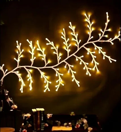Flexible LED vine garland with bendable branches and 144 warm white lights for room decor