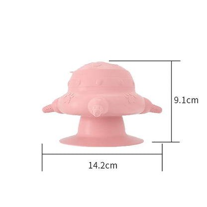 Pink silicone pet nursing bottle with bionic breast design and four pacifiers on a flat base.