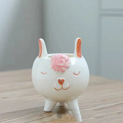 Ceramic succulent flowerpot with hand-painted cartoon animal and floral design in rustic style