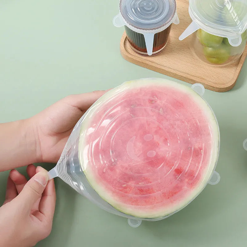 Six silicone stretch lids in graduated sizes from 6.5cm to 20.5cm diameter for covering bowls and jars