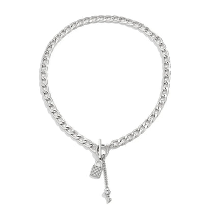 Elegant chain necklace and bracelet set with shiny lock and key pendant, fashionable ladies accessories