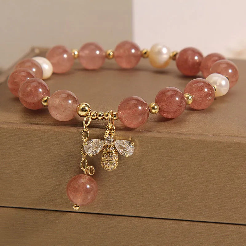 Women's freshwater pearl strawberry quartz bracelet with zircon and alloy Japanese Korean style jewellery featuring three pearls and bee charm design