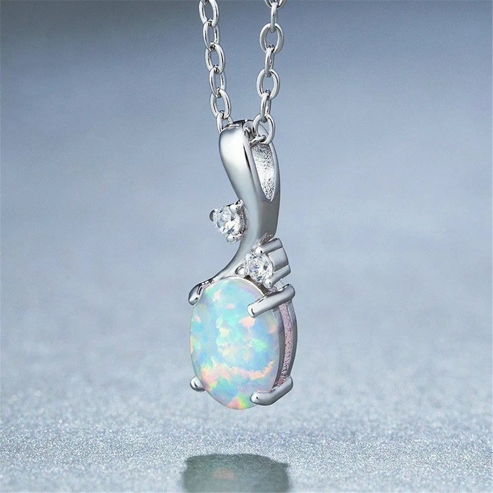 Water drop opal pendant on an adjustable O-shaped alloy necklace in rose gold or white.