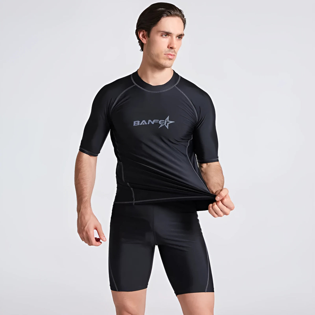 Men's quick-dry swimsuit set with swim top and pants for snorkelling and surfing activities
