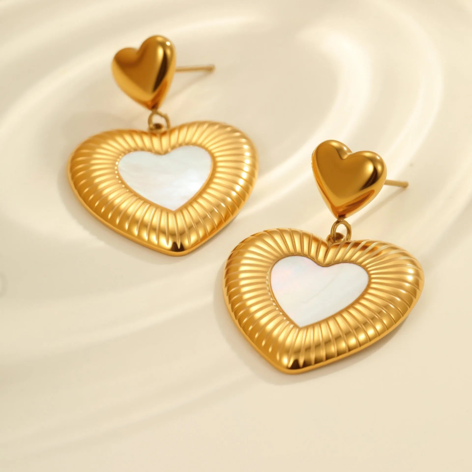 Women's gold heart fritillary earrings with stainless steel construction and 18K electroplating