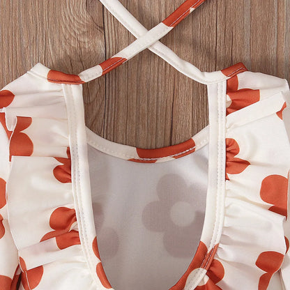 Girl's floral print swimsuit with open back crew neck design in polyester fabric