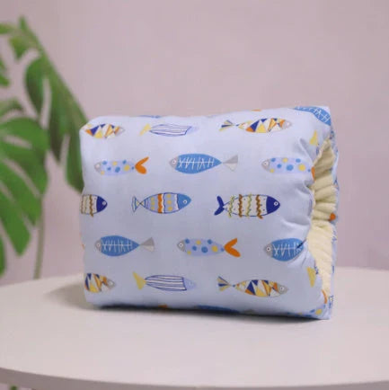 Adjustable nursing pillow with various color options, designed to provide comfort and support for breastfeeding mothers