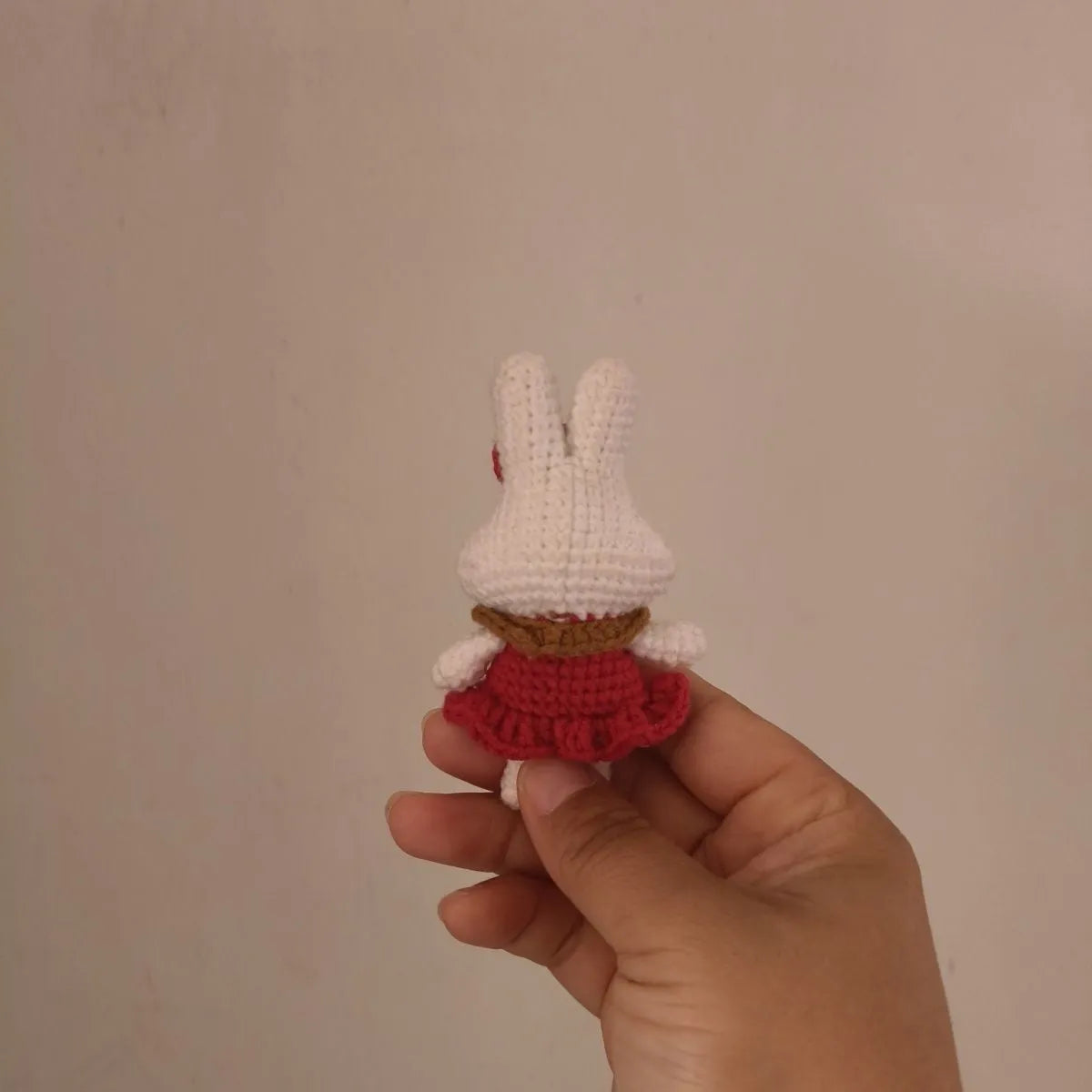 Hand-crocheted wool rabbit key chain charm with amigurumi design