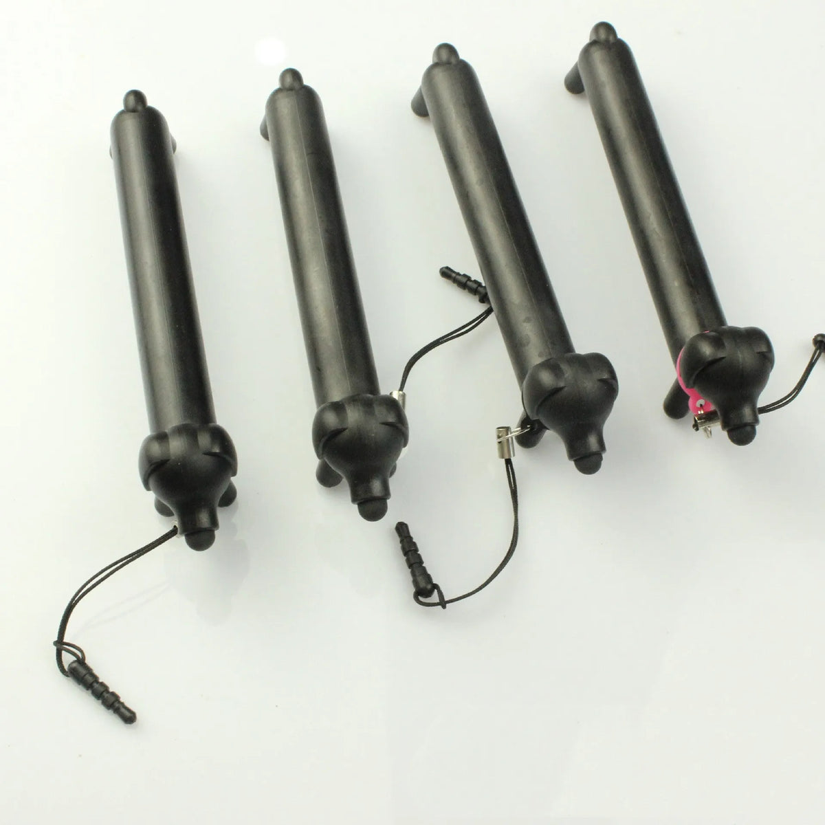 Black dog-shaped touch screen stylus with conductive body and phone stand function