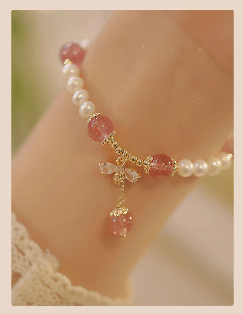 Crystal strawberry quartz bracelet for women featuring handcrafted stringed pearls with a decorative bow charm, summer INS-style jewellery accessory