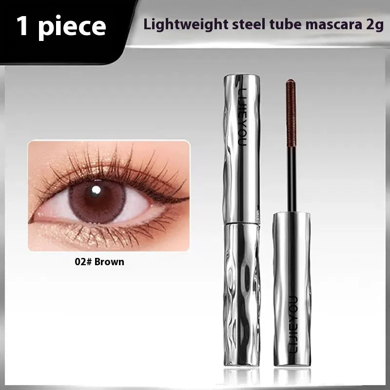 Waterproof steel tube mascara in black and brown shades with optional eyelash curler.