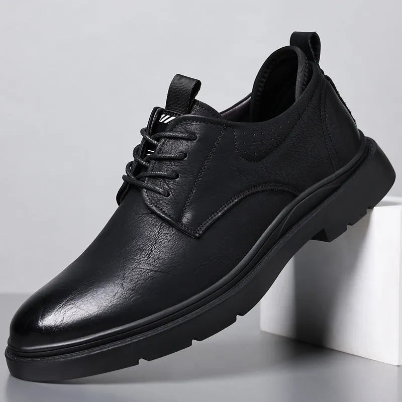 Men's black and brown leather shoes with rubber sole and sewing line detail for business and casual wear