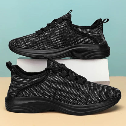 Women's black mesh casual sneakers with lace-up front and lightweight EVA sole