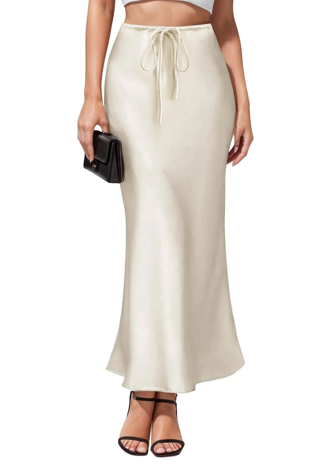Asymmetric high waist acetate skirt with irregular stitching in multiple colour options.