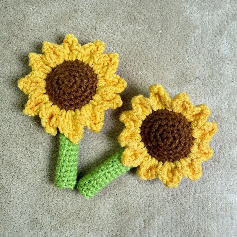 Sunflower pen cover hand-woven from faux felt and cotton yarn, a cheerful teacher's gift or student reward with a removable pen holder and durable stitching in bright yellow and brown colours, available as a single pen case or multipack of five.