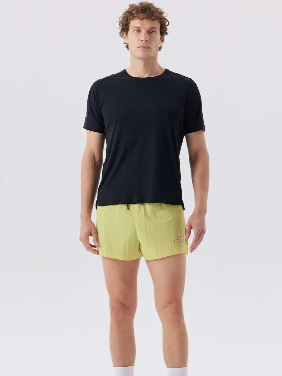 Men's side-slit sports shorts in turmeric yellow with straight leg cut and micro elastic nylon fabric
