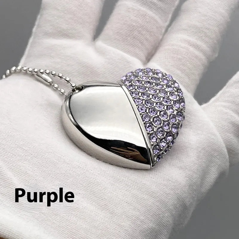 Blue heart-shaped USB flash drive with a brick-inlaid pattern on its metal surface.