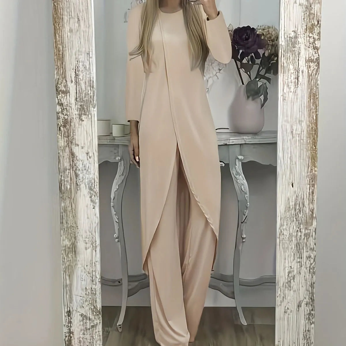 Black loose-fit polyester two-piece lounge set with long sleeves and matching trousers