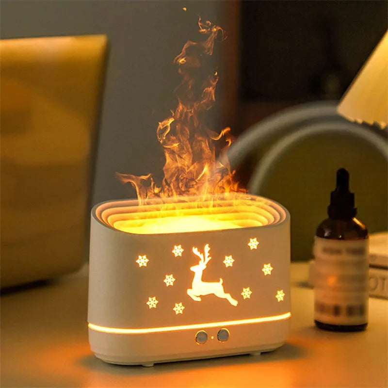 White round Elk flame effect humidifier and essential oil diffuser on a surface with mist and light on.