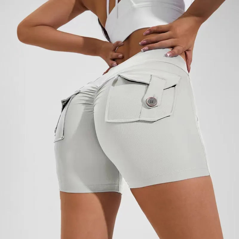 Women's high-waist quick-dry fitness shorts with side pockets in avocado green colour