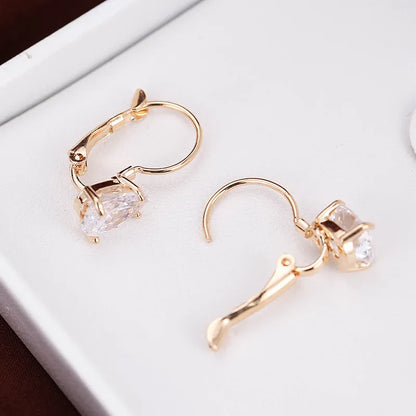 Women's copper drop earrings with gemstone inlay in gold or platinum finish