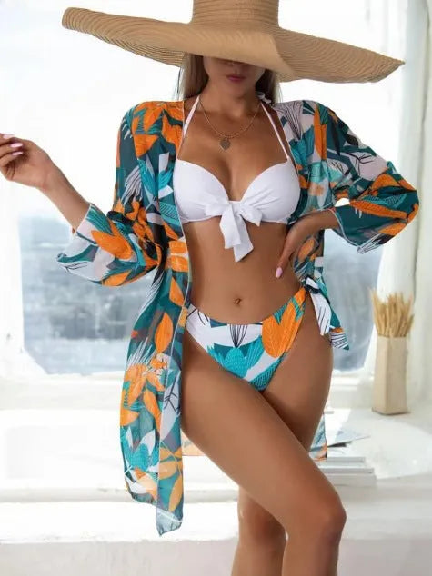 Women's three-piece mesh bikini swimsuit set with coordinating top, pants, and cover-up coat in quick-dry polyester fabric