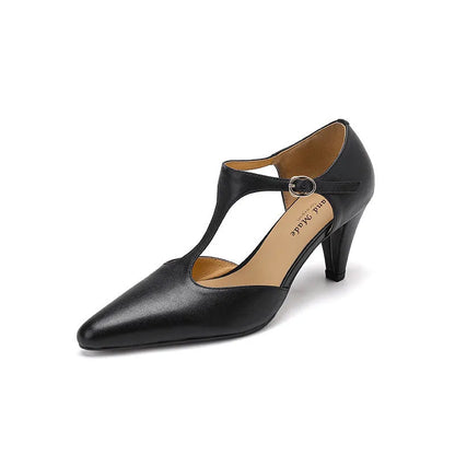 Brown retro women's T-strap sandals with a closed toe and a short stout block heel.
