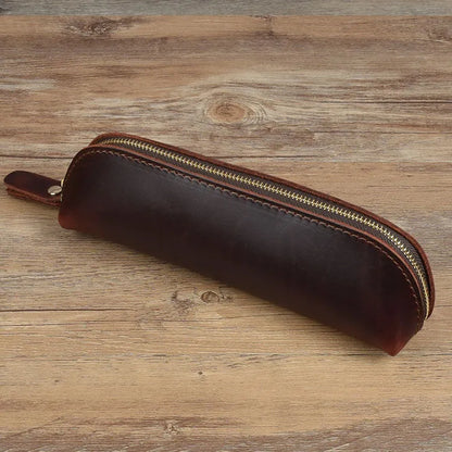Square leather pencil case in genuine cowhide measuring 18cm with zipper closure