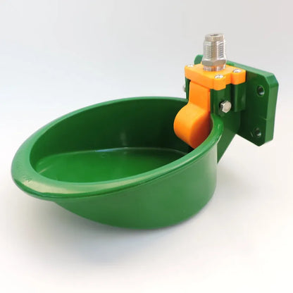 Green plastic automatic water drinking bowl for sheep and pigs on farm