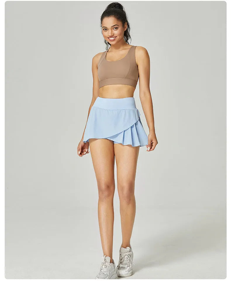 Women's solid colour quick-dry sports shorts in nylon and spandex for summer fitness activities.