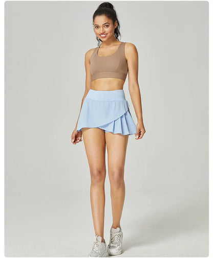 Women's solid colour quick-dry sports shorts in nylon and spandex for summer fitness activities.