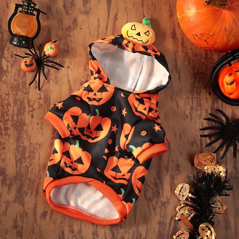Orange Halloween pumpkin skirt costume and matching sweater for a small dog on a mannequin.