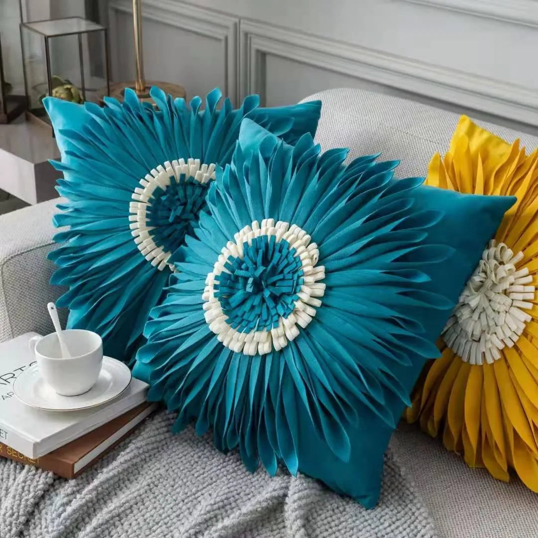 Blue velvet waist pillow with three-dimensional white chrysanthemum tufted design and fringed hem
