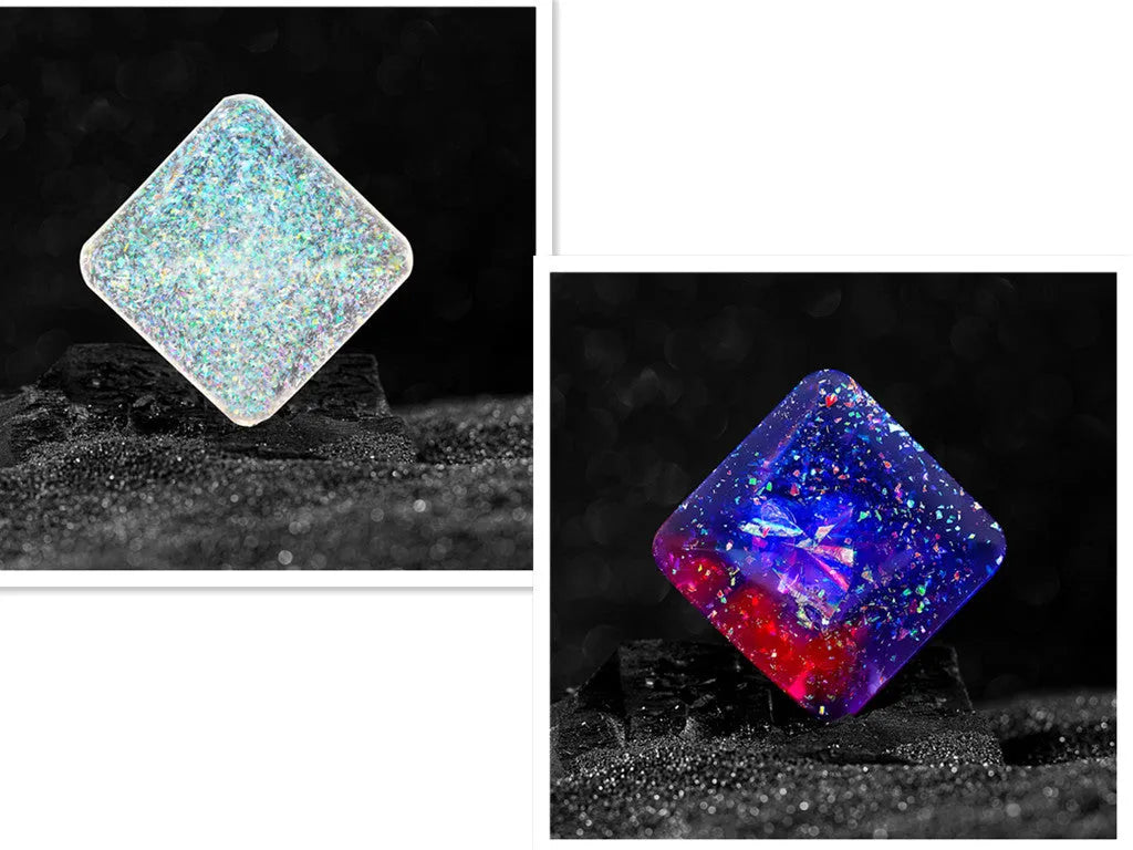Galactic edition pocket gyro desk toy on a surface, showing its quadrilateral resin construction and celestial colour design.