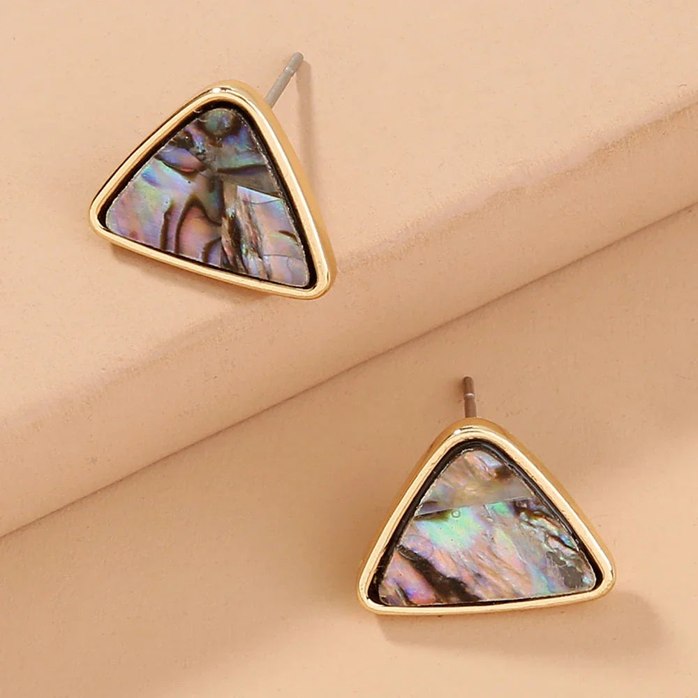 Triangular earrings with natural abalone shell set in a sleek zinc alloy frame