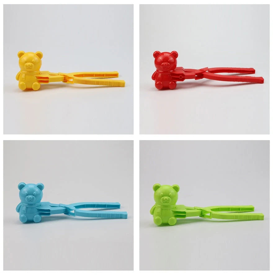 Red heart-shaped snowball maker clip for kids, perfect for winter play
