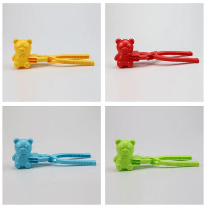 Red heart-shaped snowball maker clip for kids, perfect for winter play