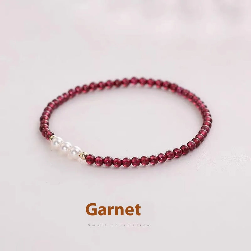 Women's crystal pearl bracelet with 3mm and 4mm Chinese garnet bead options for fashion and office wear, artificial pearl bracelet jewellery accessory with adjustable fit and contemporary design