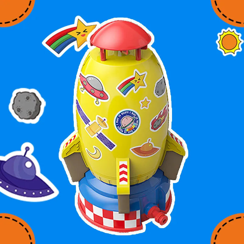 Yellow outdoor water pressure rocket launcher toy for kids on a green lawn.