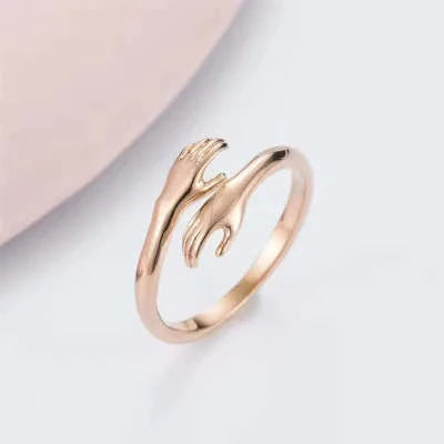 Adjustable Alloy Hands Hug Ring in silver and gold with unique geometry design