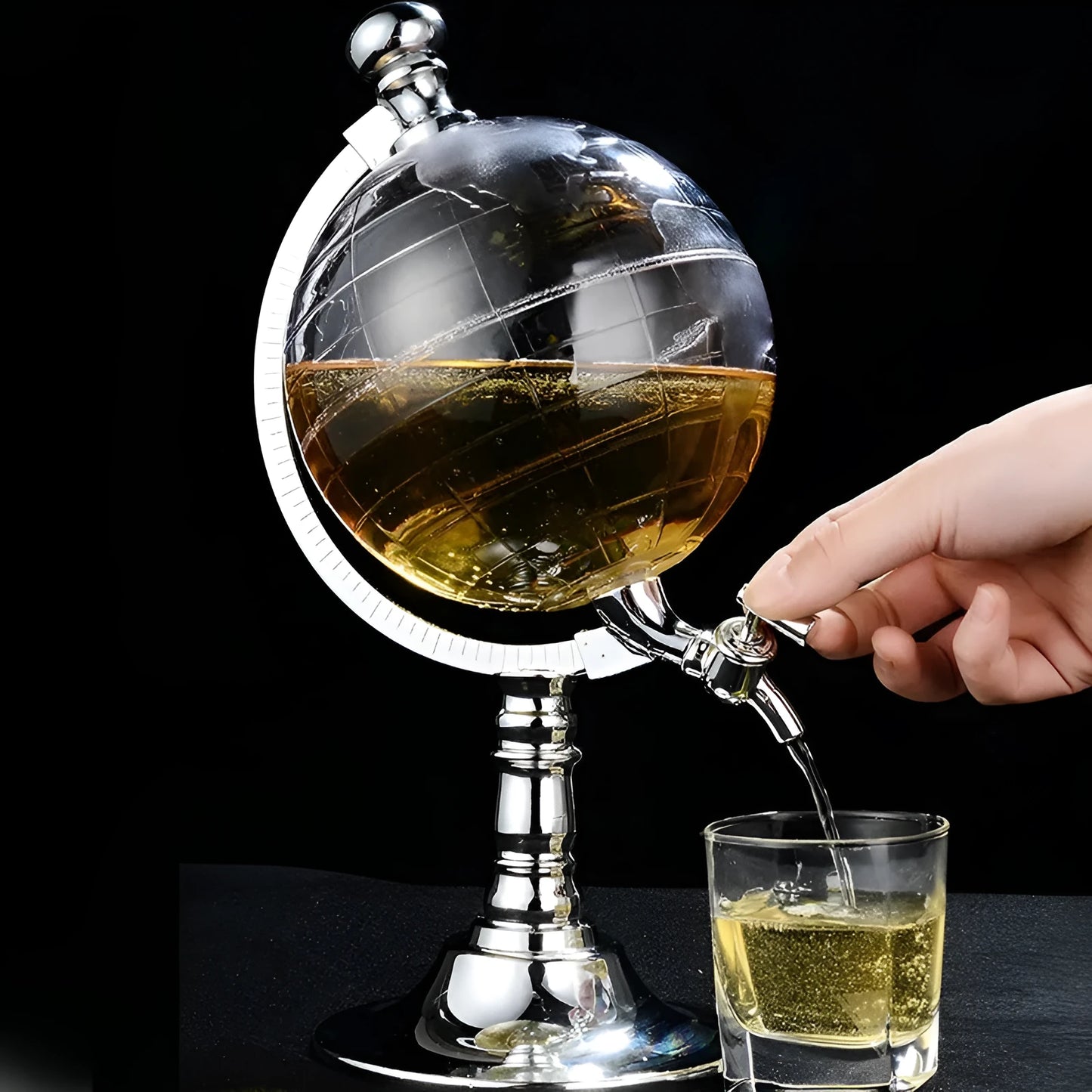 Transparent globe drink dispenser on silver stand with 1L capacity for beverages
