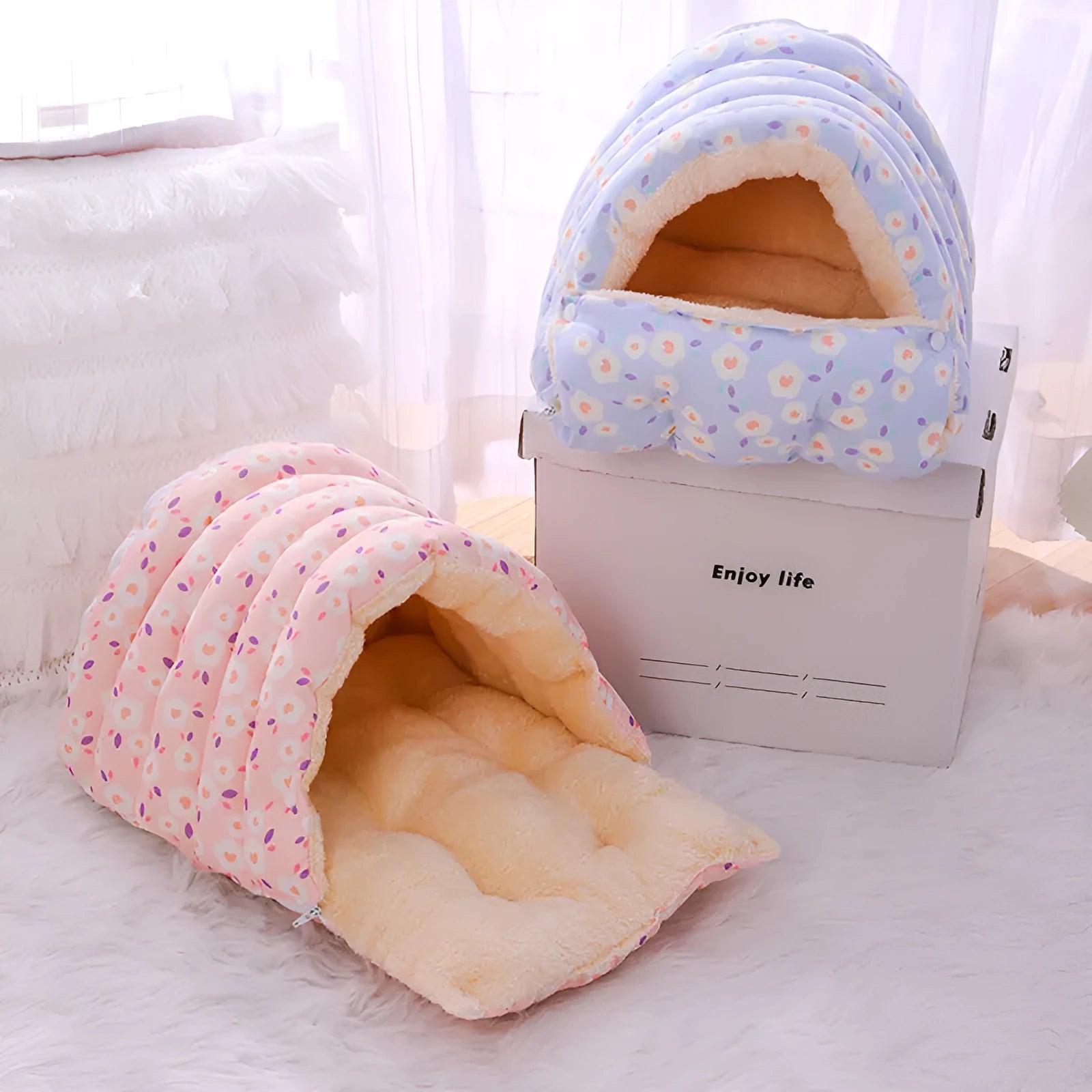 Enclosed winter cat nest with removable cover in a small blue flower print pattern.
