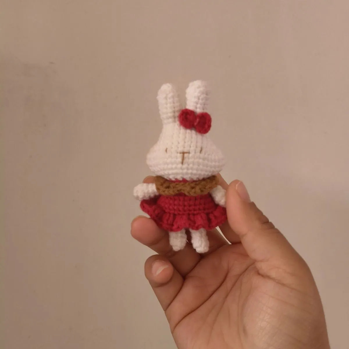 Hand-crocheted wool rabbit key chain charm with amigurumi design