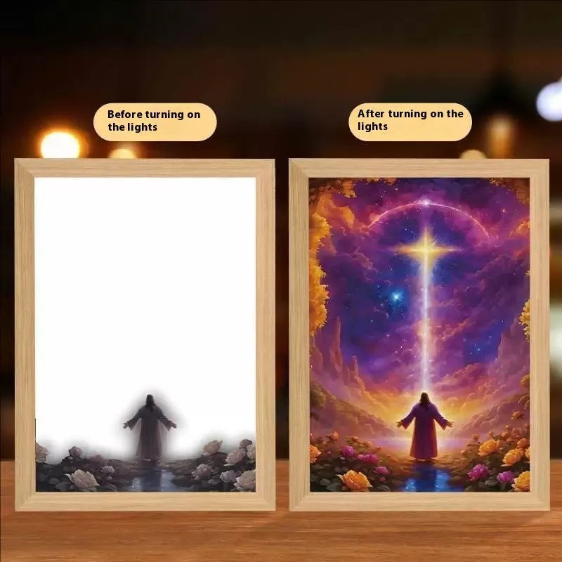 Modern rectangular light painting photo frame displaying an illuminated cross and scenic artwork.