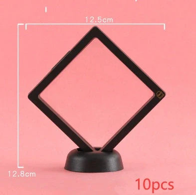 3D floating jewelry coin display stand in white and black, showcasing collectibles in mid-air