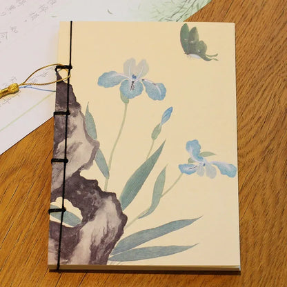 A5 antique wire-bound notebook with classical artwork cover, black oil wax rope binding, and decorative tassels