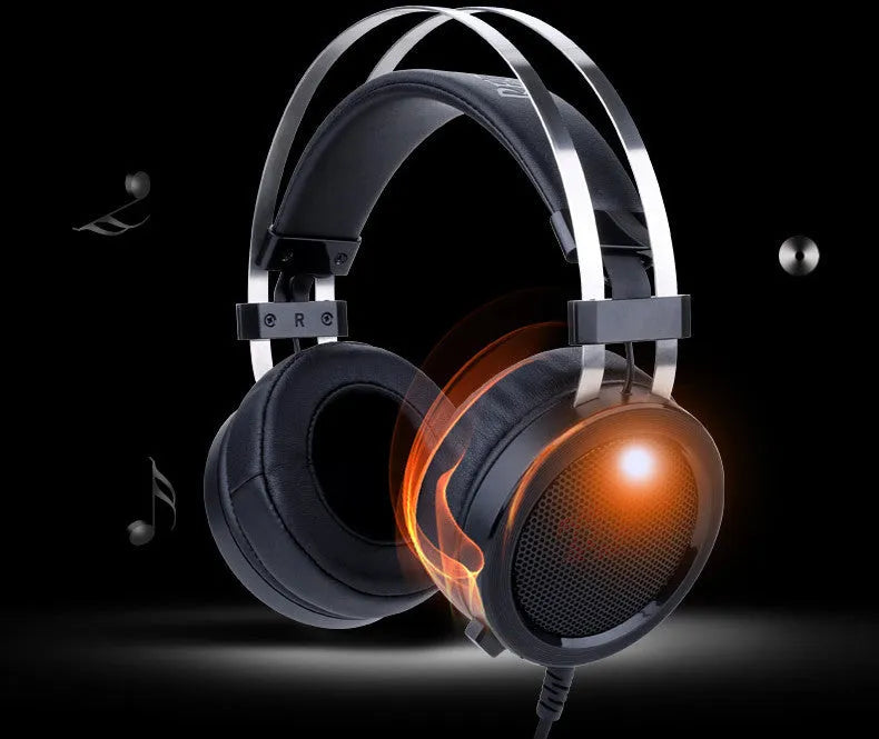 Black wired computer gaming headset with over-ear cups and a 3.5mm jack.